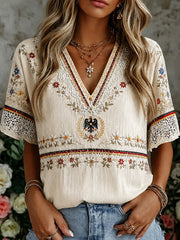 Damen-Boho-T-Shirt mit deutschem Blumenmuster, mittellange Ärmel und V-Ausschnitt